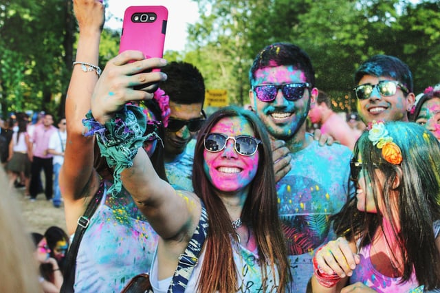 People taking selfie after color run
